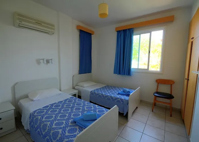 Апарт-отель Renos Полис